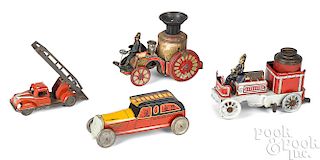 Two tin lithograph fire pumpers, etc.
