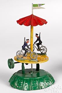 Painted tin cyclist carousel steam toy accessory
