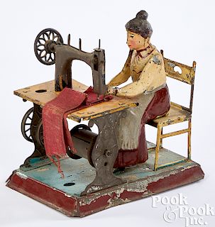 Gunthermann tin woman at sewing machine steam toy