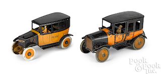 Two tin lithograph wind-up Yellow Taxis