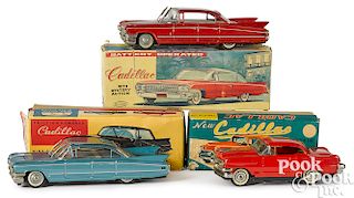 Three Japanese tin friction Cadillacs