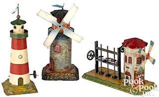 Three windmill and lighthouse steam toy accessories