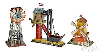 Three windmill steam toy accessories