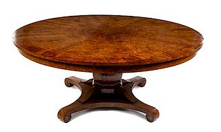 A Biedermeier Style Burlwood Dining Table Diameter 70 1/4 inches (closed).