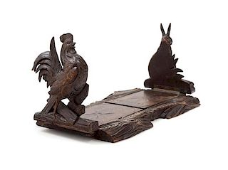 A Black Forest Carved Oak Rooster And Rabbit Figural Book Slide Width 9 3/4 inches (closed).