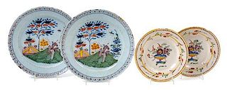 Two Pairs of Delft Pottery Plates Diameter of larger pair 12 inches.