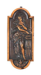 A Neoclassical Patinated Metal Plaque Height 15 1/2 x width 6 1/2 inches.