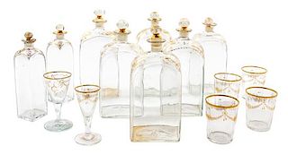 A Set of Fourteen Continental Glass Table Articles Height of decanter 9 inches.