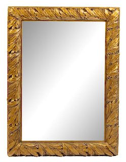 A Continental Giltwood Mirror Height 41 x width 30 3/4 inches.