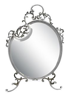 A Silvered Dressing Mirror Height 28 inches.