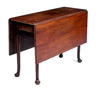 A Queen Anne Style Mahogany Drop-Leaf Table Height 28 x width 40 x depth 15 3/4 inches (closed).