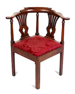 A George III Mahogany Corner Chair Height 32 3/4 inches.