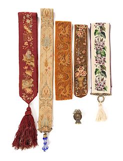 Five Victorian or Victorian Style Needlepoint Bell Pulls Length of longest 88 inches.