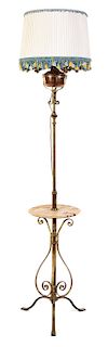 A Copper and Brass Oil Lamp Table Height 83 inches.