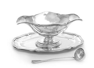 * An Italian Silver Sauce Boat, Federico Tornotti, Rome, 20th Century, the body with an engraved coat-of-arms, together with an