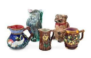 A Collection of Majolica Pitchers Height of tallest 9 1/4 inches.