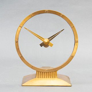 Reloj de mesa. Estados Unidos. Siglo XX. Marca Jefferson, modelo Golden Hour o Misterioso. Mecanismo elŽctrico.