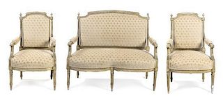 A Louis XVI Style Cream Painted Parlor Suite, Width of settee 44 1/2 inches.