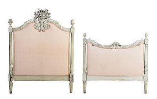 A Louis XVI Style Cream Painted Bed, Height of headboard 56 1/4 x width 43 inches.