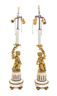 A Pair of Louis XVI Style Gilt Bronze and Marble Candlesticks, Height 17 inches.
