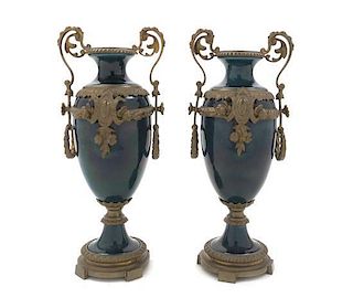 A Pair of Louis XVI Style Bronze Mounted Porcelain Urns, Height 10 1/2 inches.
