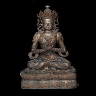Buda Vajradhara. Siglo XX. Fundición en bronce patinado y latón. Decorado con elementos orgánicos y con vara de phurba.