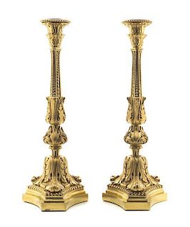 A Pair of Neoclassical Gilt Bronze Candlesticks, Height 14 1/4 inches.