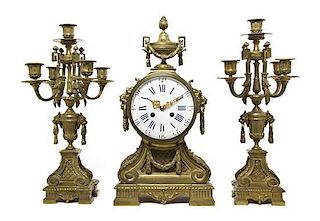 A Louis XVI Style Gilt Bronze Clock Garniture, Height of clock 18 inches.