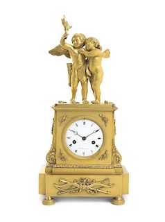A Louis XVI Gilt Bronze Figural Mantel Clock, Height 16 1/2 inches.