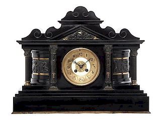 A Continental Gilt and Patinated Bronze Mounted Slate Mantel Clock, Width 18 inches.