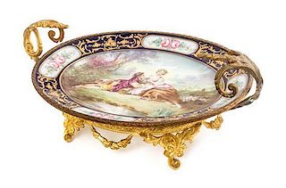 A Sevres Style Gilt Metal Mounted Porcelain Tray, Width over handles 15 1/2 inches.
