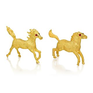 A Pair of 22K Gold Horses