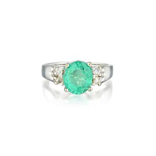 A 14K Gold Emerald and Diamond Ring
