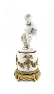 A Sevres Style Bisque Porcelain and Gilt Bronze Mounted Figure, Height overall 10 inches.