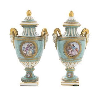 A Pair of Sevres Style Porcelain Urns, Height 8 1/2 inches.