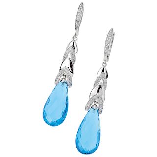 A topaz and diamond 14K white gold pair of earrings.