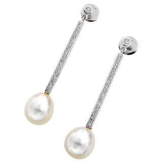 A cultured pearl and diamond 14K white gold pair of earrings.