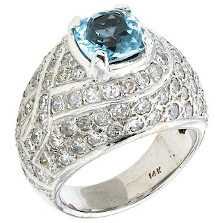 An aquamarine and diamond 10K white gold ring.