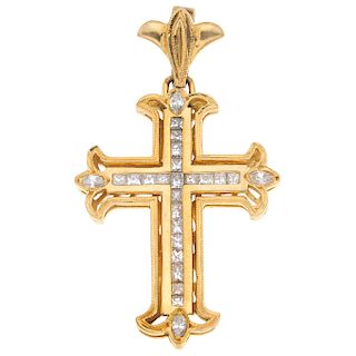 A diamond 14K yellow gold cross pendant.