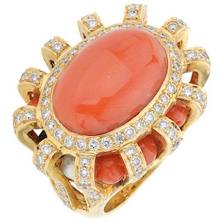 A coral, pearl, onyx and diamond 18K yellow gold ring.