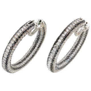 DANIEL K "Avenue" diamond 18K white gold pair of hoop earrings.