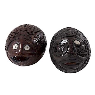A PAIR OF CARVED COCONUT MONEYBOXES