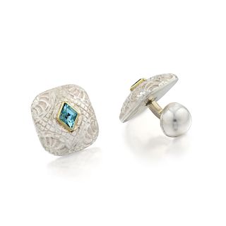 A Pair of 18K and Silver Blue Topaz Cufflinks