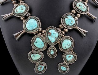 A STERLING SQUASH BLOSSOM NECKLACE W/ TURQUOISE
