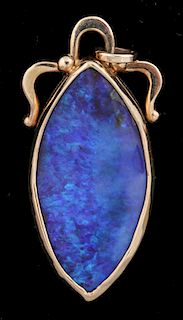 A 14K GOLD AND OPAL PENDANT SIGNED MICKY ROOF