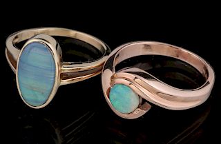TWO LADIES' 14K GOLD AND OPAL FASHION RINGS