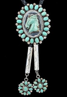 A NAVAJO BOLO TIE WITH UNUSUAL CARVED HORSE HEAD