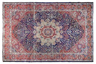 * A Tabriz Wool Rug 12 feet x 8 feet 8 inches.