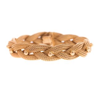 A Ladies Woven Bracelet in 18K Gold