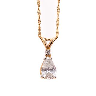 A Ladies Pear Shape Diamond Pendant in 14K